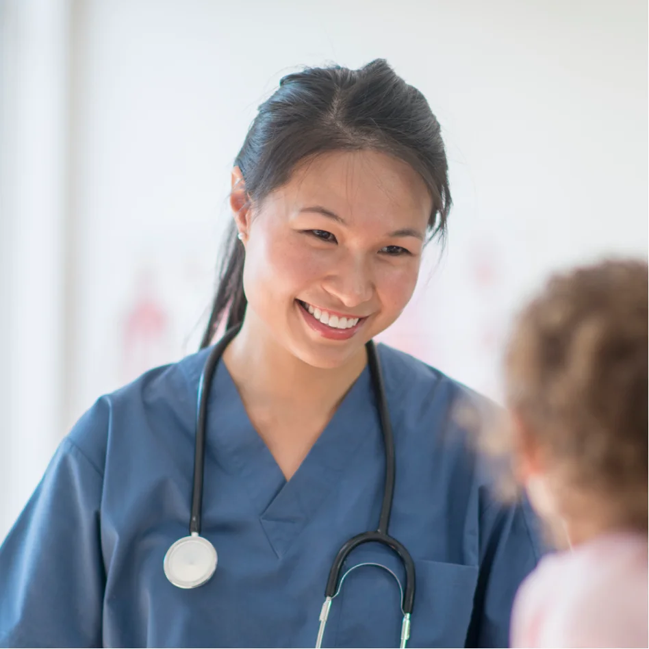 Doctor smiling to a patient